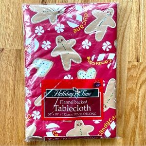 Holiday gingerbread man and Candy cane tablecloth by Holiday Time.